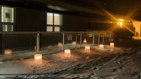   A resident’s family shows their appreciation for Weyburn Special Care Home staff with an ice candle display.