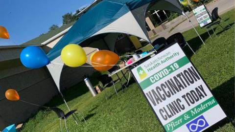 Sign advertising pop-up clinic in La Loche