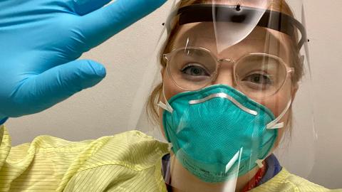 A nurse in full personal protective equipment for working with COVID-19 patients in the ICU. 