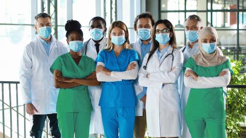 A team of medical professionals wearing masks.