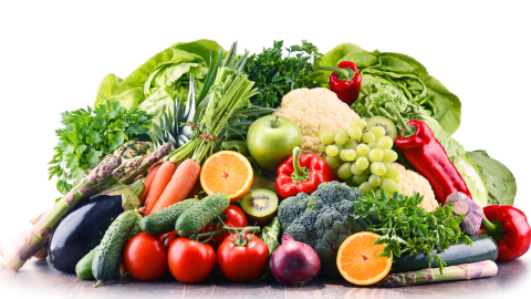 Boxes of fresh fruits and vegetables are put together for patients