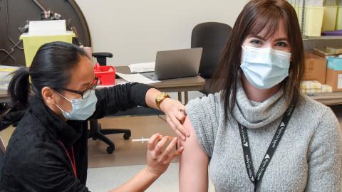 staff member receiving vaccination