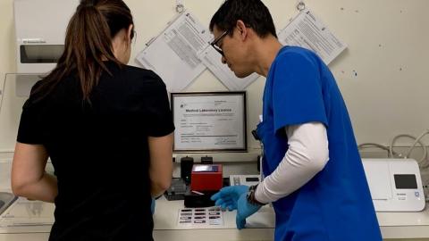 Trained hospital staff use new lab equipment to conduct point of care lab tests at Wynyard Hospital. 