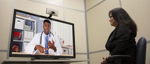 A patient connects with a health-care worker via Telehealth