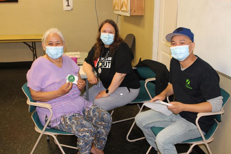 A woman receives a vaccine