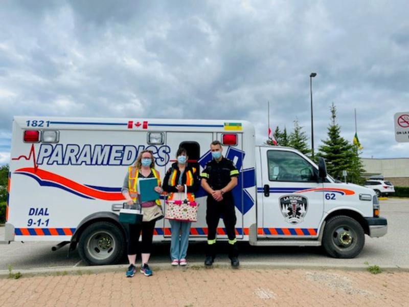 The La Ronge Public Health and La Ronge EMS Paramedics providing a mobile vaccination clinic. 