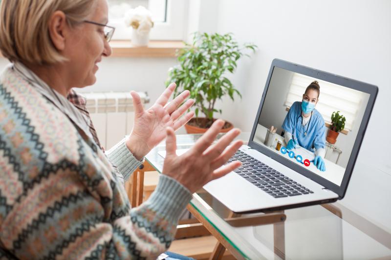 Woman attending virtual appointment 