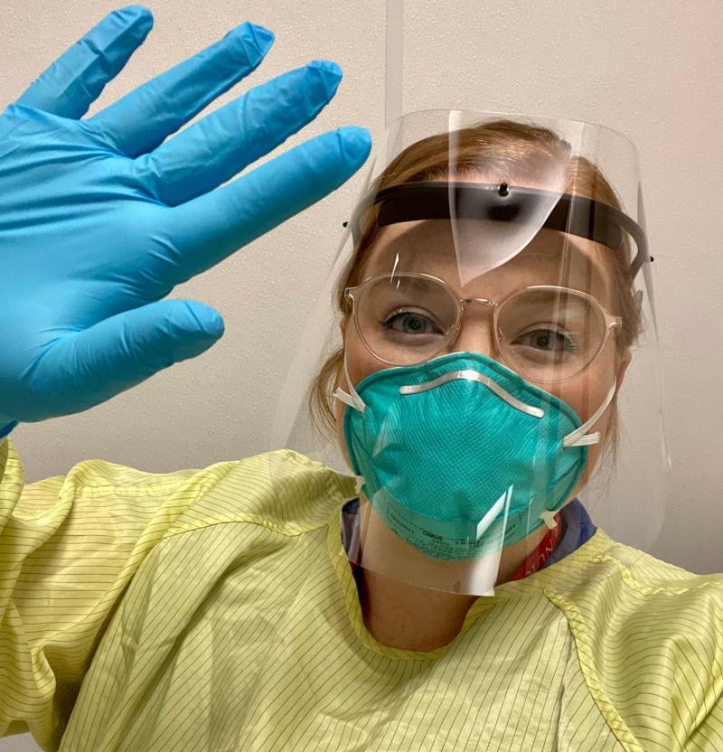  A nurse in full personal protective equipment for working with COVID-19 patients in the ICU. 