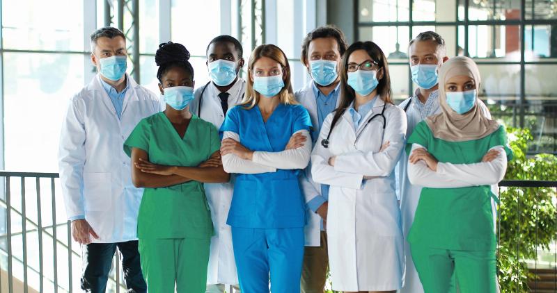 A team of medical professionals wearing masks.