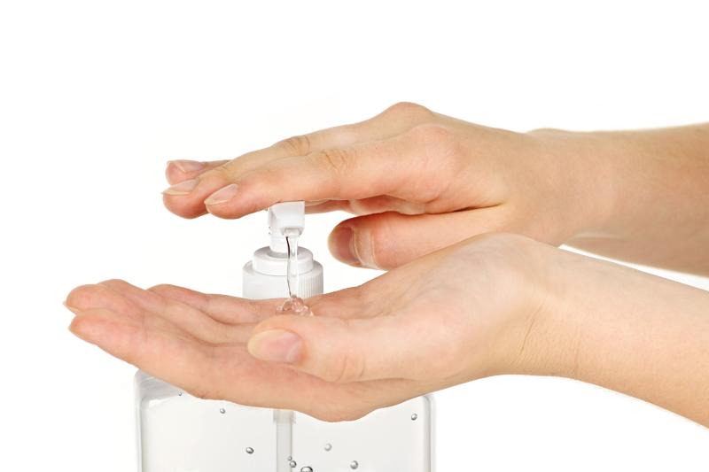 Hands using sanitizer