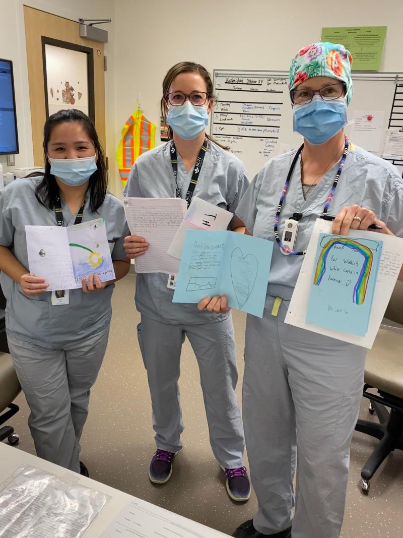 JPCH operating room staff show some of the cards and letters they received.