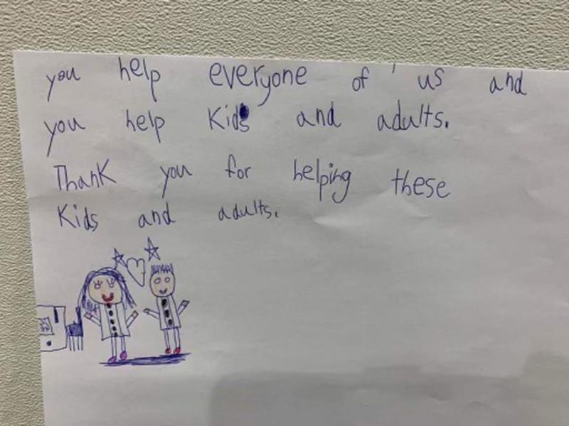 A note from a child hanging on a Wall of Fame.