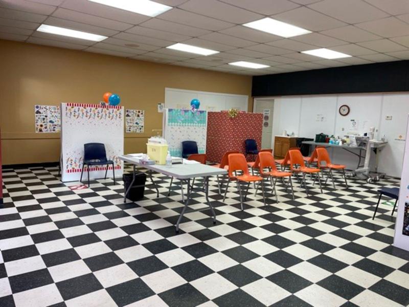 A clinic in Moosomin ready for kids with balloons and selfie walls.