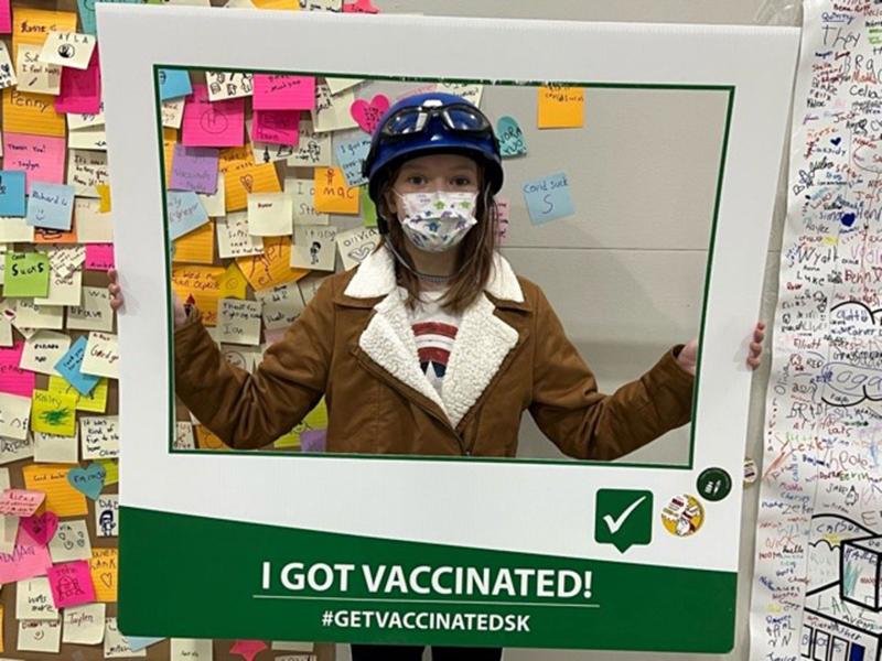 It’s official! Morgan MacFarlane poses after getting vaccinated.