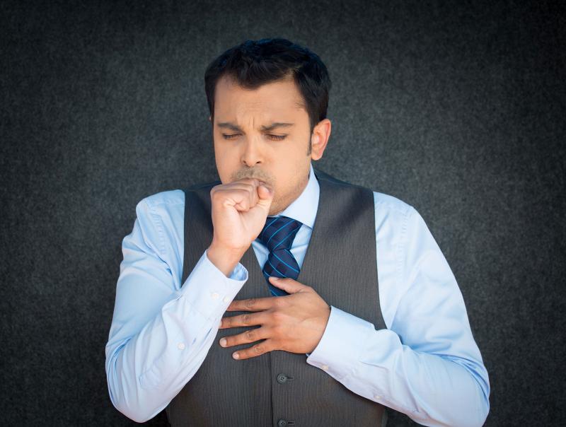 Man coughing. 