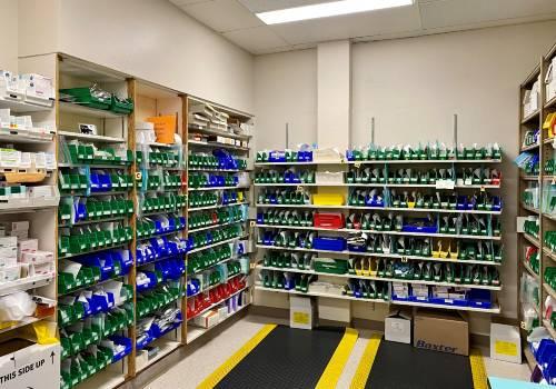 A room filled with shelves of compartments containing different medications.