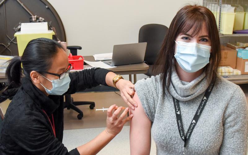 staff member receiving vaccination