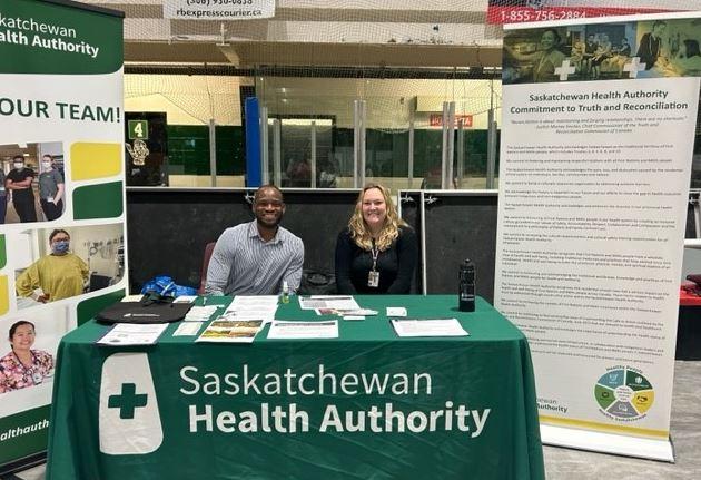 Managers at a booth at the Lac La Ronge career fair