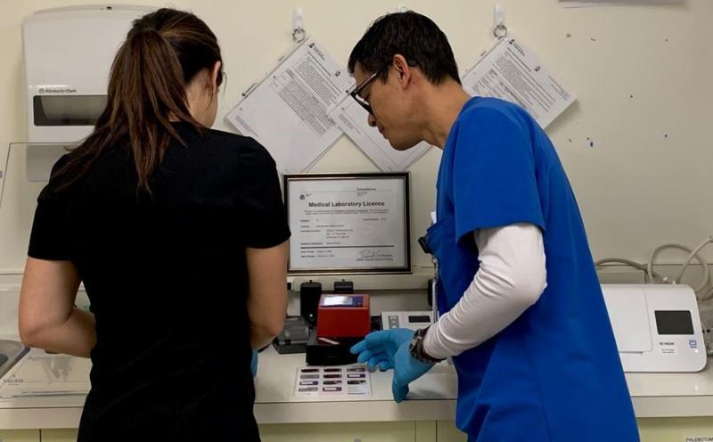 Trained hospital staff use new lab equipment to conduct point of care lab tests at Wynyard Hospital. 