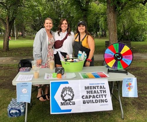 Three members of the Mental Health Capacity Building team in Prince Albert are pictured standing together